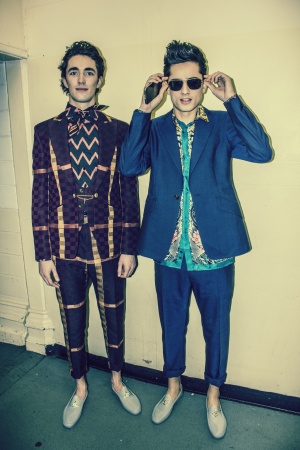 Tarun (right) looking slick in his Vivienne Westwood suit and Versace shirt